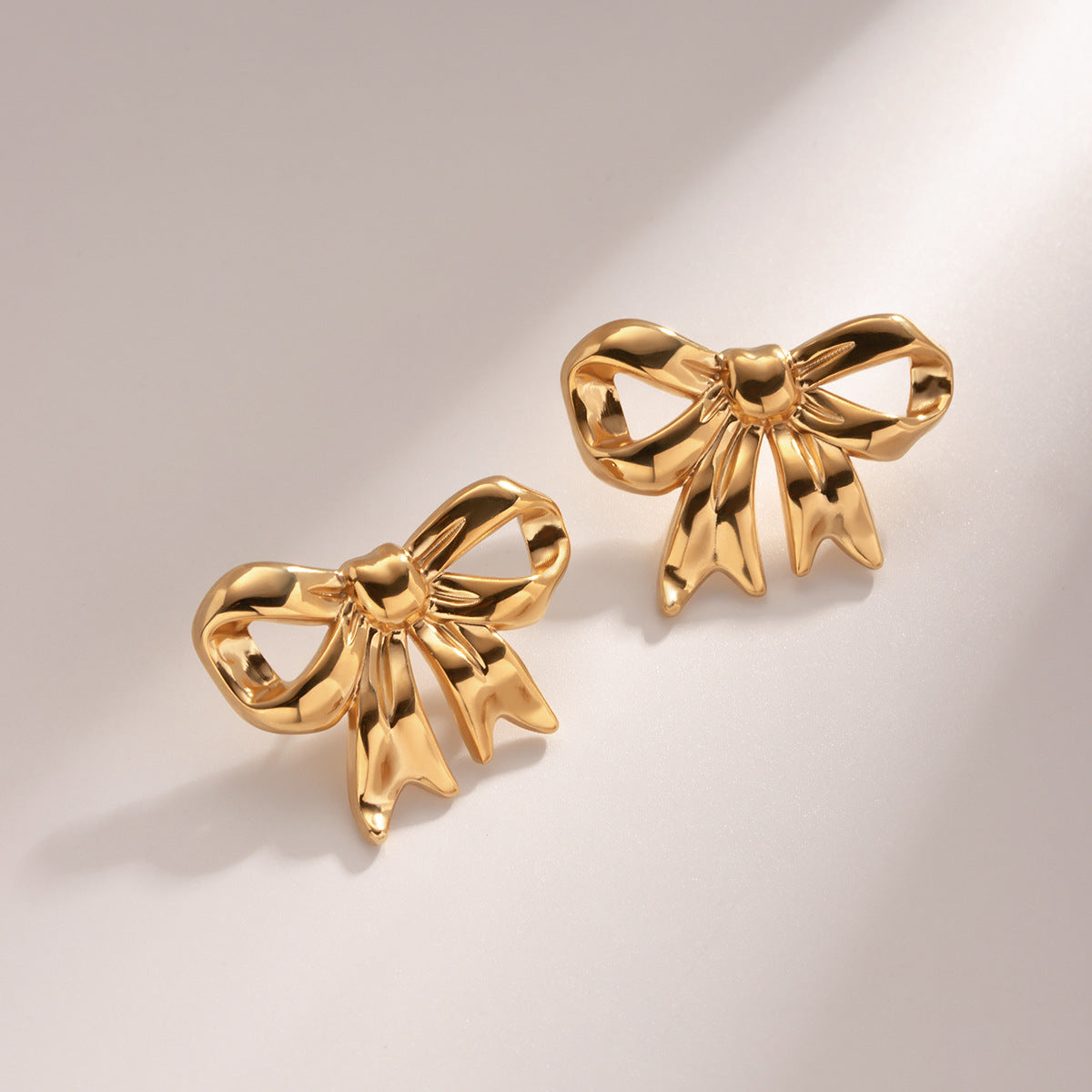 Sweetbones Hot selling personalized and versatile 18k gold stainless steel bow earrings and earrings accessories